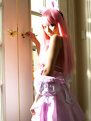 Sexy gravure idol babe naked in a cute pink wig and maid costume - Japarn porn pics at JapHole.com