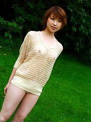Cute asian babe shows off her naked plump tits under her sweater - Japarn porn pics at JapHole.com