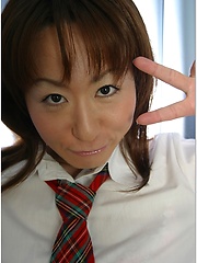 Young redhead japanese school girl Miki - Japarn porn pics at JapHole.com