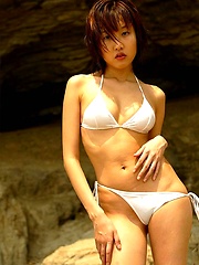 Sexy Japanese teen enjoys modeling in tight shorts - Japarn porn pics at JapHole.com