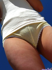 Asian babe Asuka shows off her great tits in the sun - Japarn porn pics at JapHole.com