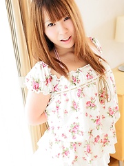 Pretty japanese teen Yumi Takaoka shows shaved pussy - Japarn porn pics at JapHole.com