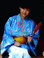 Ayami Sakurai posing big breasts in colored suite - Japarn porn pics at JapHole.com
