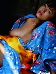 Ayami Sakurai posing big breasts in colored suite - Japarn porn pics at JapHole.com
