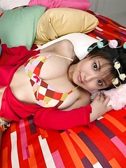 Hanai Miri posing her natural big tits in colored bikini - Japarn porn pics at JapHole.com