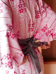 As Uri lifts up her Japanese Yukata, her silky white panties and wide hips are exposed. The thong is so thin it can't cover the creases of her booty hole. - Japarn porn pics at JapHole.com