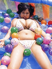 Fuko posing her watermelons tits next to real watermelons! - Japarn porn pics at JapHole.com