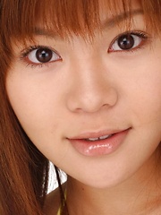 Av idol Yoko Matsugane posing in yellow bikini - Japarn porn pics at JapHole.com