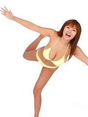 Av idol Yoko Matsugane posing in yellow bikini - Japarn porn pics at JapHole.com