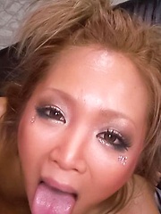 Riku Hinano licks and rubs woody before swallowing it in mouth - Japarn porn pics at JapHole.com