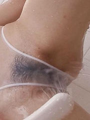 Noriko Kago plays with shower on peach over see through shower - Japarn porn pics at JapHole.com