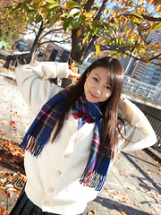 Tomoyo Hoshino Asian in short skirt goes to a walk in the city - Japarn porn pics at JapHole.com