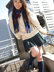 Tomoyo Hoshino Asian in short skirt goes to a walk in the city - Japarn porn pics at JapHole.com