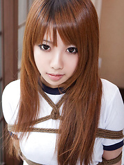 Dimdim Asian in long socks and sports outfit has hands tied - Japarn porn pics at JapHole.com