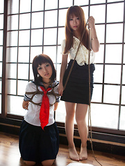 Dimdim Asian in uniform is tied in ropes by another sexy cupcake - Japarn porn pics at JapHole.com