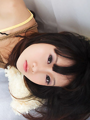 Miko Asian doll in fishnets has hands and boobies tied with ropes