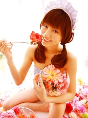 Yumi Sugimoto Asian is sexy baby surrounded by colorful flowers - Japarn porn pics at JapHole.com