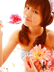 Yumi Sugimoto Asian is sexy baby surrounded by colorful flowers - Japarn porn pics at JapHole.com