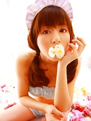 Yumi Sugimoto Asian is sexy baby surrounded by colorful flowers - Japarn porn pics at JapHole.com