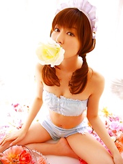 Yumi Sugimoto Asian is sexy baby surrounded by colorful flowers - Japarn porn pics at JapHole.com