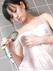Manami Komukai Asian has orgasms and gives blowjob at shower - Japarn porn pics at JapHole.com