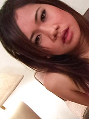 Eve Asian nymphet rubs her cunt with long nails and sucks shlong - Japarn porn pics at JapHole.com