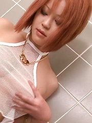 SARA Asian doll teases her boobs with shower over fishnet blouse - Japarn porn pics at JapHole.com