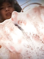 Nozomi Hatsuki Asian puts soap foam on her big jugs and on peach - Japarn porn pics at JapHole.com