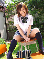 Schoolgirl Iyo Hanak poses at the open air in sexy skirt - Japarn porn pics at JapHole.com