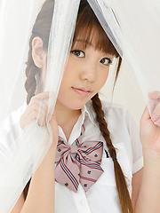 Mizuho Shiraishi Asian with pigtails and uniform sits with ass up - Japarn porn pics at JapHole.com