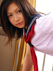 Kaori Ishii Asian is naughty and shows legs under uniform skirt - Japarn porn pics at JapHole.com