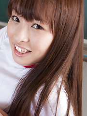 Maho Kiruma Asian in sports equipment plays with ball on desk - Japarn porn pics at JapHole.com