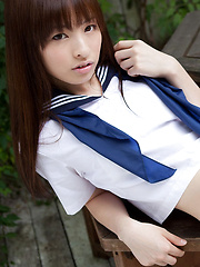 Maho Kimura Asian undresses school uniform right in the park - Japarn porn pics at JapHole.com