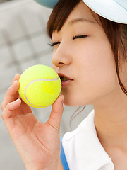 Kana Yuuki Asian shows flexibility while playing with tennis ball - Japarn porn pics at JapHole.com