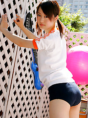 Naoko Sawano Asian in sports outfit plays with balls in garden - Japarn porn pics at JapHole.com