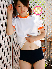 Naoko Sawano Asian in sports outfit plays with balls in garden - Japarn porn pics at JapHole.com