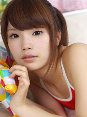 Manami Sato Asian with sexy curves in bath suit plays with pillow - Japarn porn pics at JapHole.com