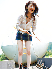 Neo Asian babe in short skirt loves playing in dangerous places - Japarn porn pics at JapHole.com