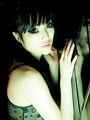 Neo Asian babe with firm big boobs in kinky bra is club dancer - Japarn porn pics at JapHole.com