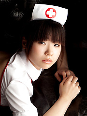 Hikari Azuma Asian shows pussy in tiny thong of nurse uniform - Japarn porn pics at JapHole.com
