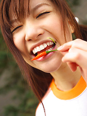 Cocoro Amachi Asianin shorts plays with ball and bike in garden - Japarn porn pics at JapHole.com