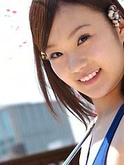 Kana Yuuki Asian in bath suit plays with umbrella in the balcony - Japarn porn pics at JapHole.com