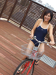 Ageha Yagyu Asian in spandex bath suit shows curves on bike - Japarn porn pics at JapHole.com