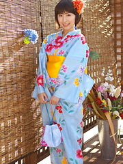 Rio Matsushita Asian shows sexy legs under geisha dress outdoor - Japarn porn pics at JapHole.com