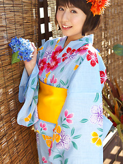 Rio Matsushita Asian shows sexy legs under geisha dress outdoor - Japarn porn pics at JapHole.com