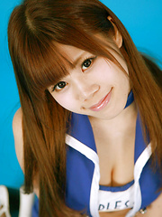 Asuka Nakano Asian with nasty smile poses in very short skirt - Japarn porn pics at JapHole.com