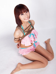 Ayaka Asian babe in tiny lingerie smiles while is tied in ropes - Japarn porn pics at JapHole.com