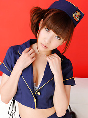 Chihiro Akiha Asian captain in short skirt shows hot cleavage - Japarn porn pics at JapHole.com