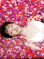 Airi Suzuki Asian in bath suit enjoys petals all over her body - Japarn porn pics at JapHole.com