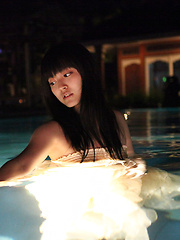 Airi Suzuki Asian in bath suit enjoys petals all over her body - Japarn porn pics at JapHole.com